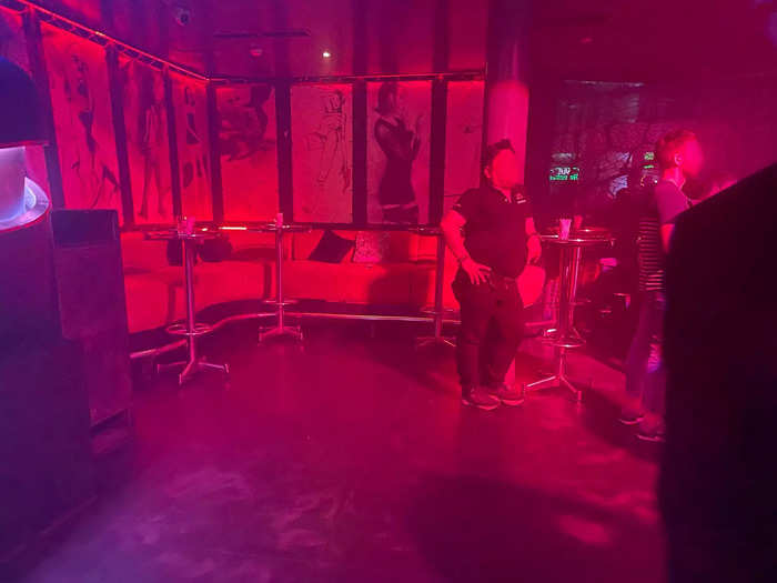 At around midnight, the club got even emptier. All that was left were a few women dressed to the nines, empty booths, and security guards waiting for their shifts to end.