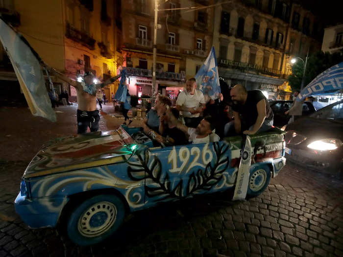 Fans also stuffed themselves into small cars celebrating the club.