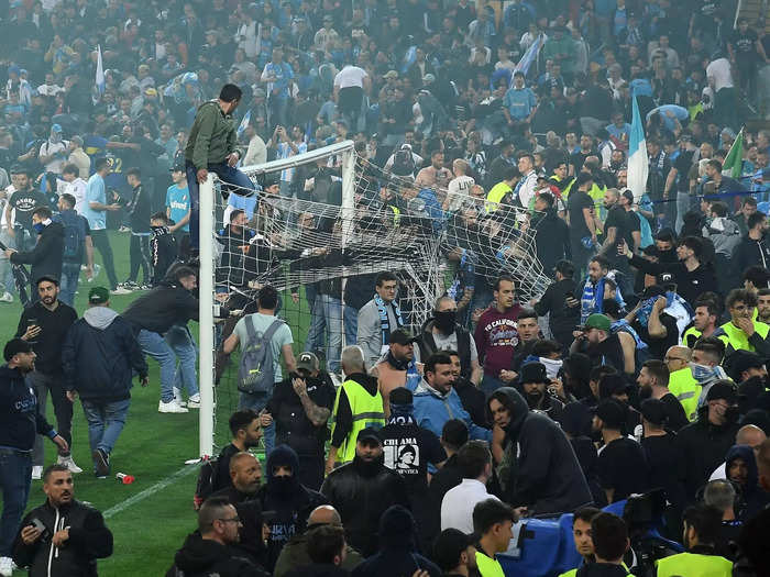 The celebration first erupted at the away game in Udine as fans stormed the pitch.