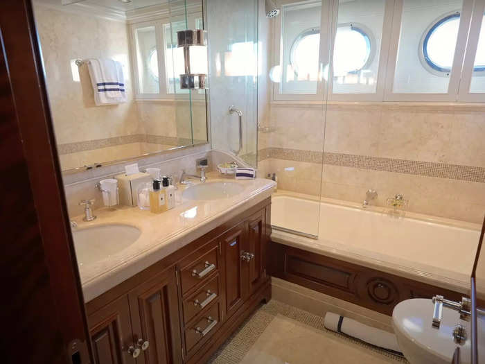 Guest bathrooms are fitted with bathtubs, mosaic tiling, and heated floors.