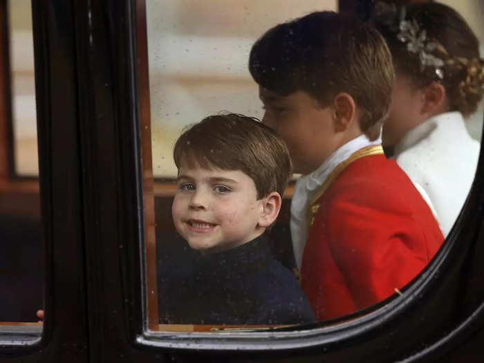 But used to the royal attention, he managed a smile for the cameras.