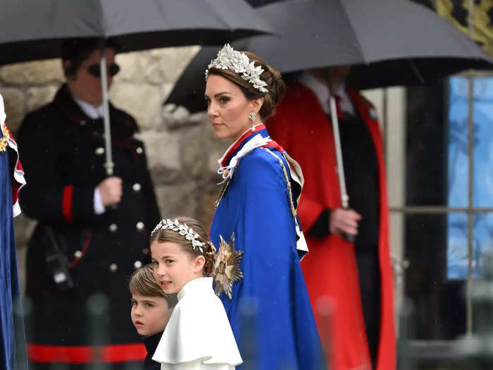 Charlotte matched her mom as both wore white-and-silver headpieces designed by Jess Collett in collaboration with Alexander McQueen. They also wore coordinating Alexander McQueen dresses.