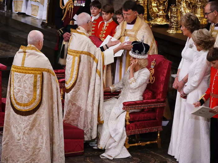 The new queen adjusted her hair after the Archbishop placed the crown on her head, a relatable moment even for those who don