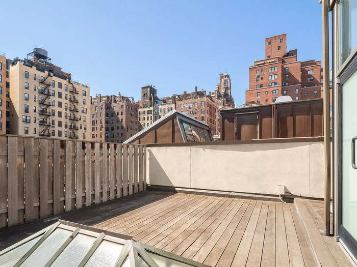 Unlike the typical New York City home, this house boast several outdoor spaces including a roof deck, garden, and at least three balconies.