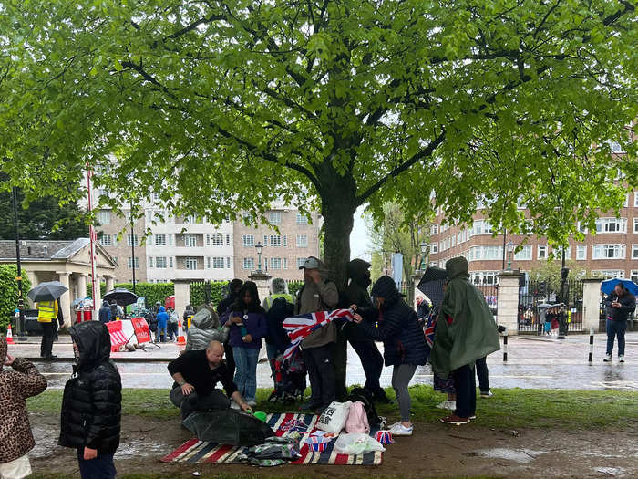 Since there was no shelter or seating, most people ate their food under the trees or stood up under umbrellas.