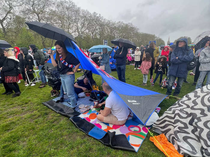 Some came prepared with tents, but most people were stuck standing or sitting in mud puddles as King Charles was crowned.