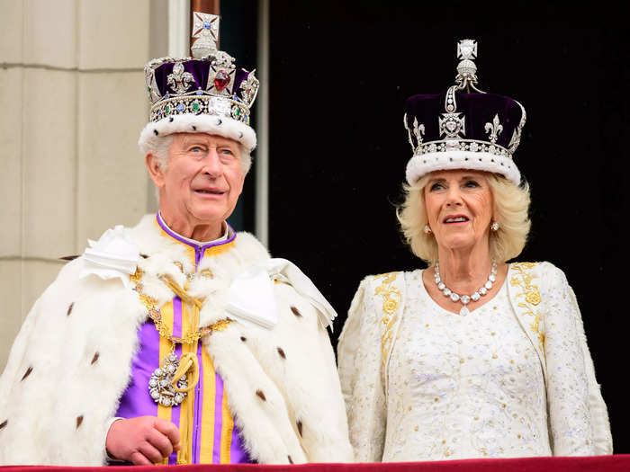 King Charles and Queen Camilla waved to well-wishers from the Buckingham Palace balcony.