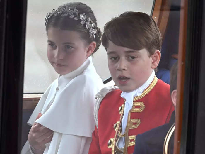 Prince George and Princess Charlotte could be seen inside a carriage of their own.