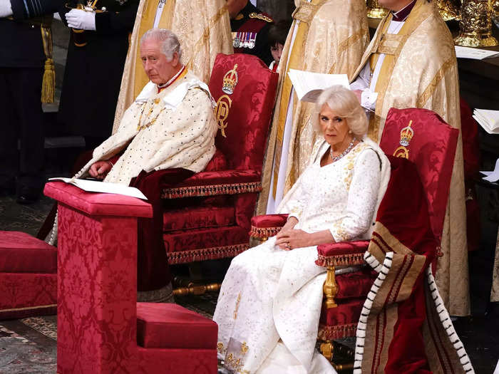 During the coronation ceremony, King Charles and Queen Camilla looked serious as they waited to be crowned.