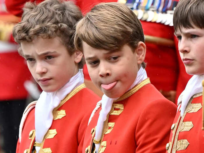 Before the coronation service began at Westminster Abbey, there was plenty of standing around. Prince George, 9, was photographed sticking out his tongue ahead of the historic event.