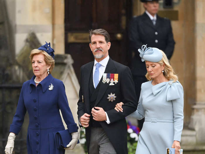 Queen Anne-Marie, Prince Pavlos, and Princess Marie-Chantal of Greece wore outfits featuring different shades of the color blue.