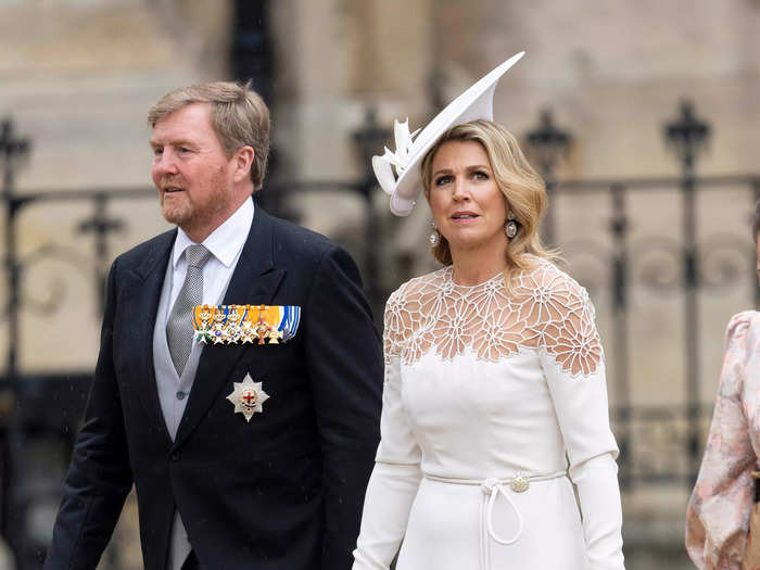 Dutch royalty King Willem-Alexander wore a morning suit while his wife, Queen Maxima, wore a delicately embroidered white gown.