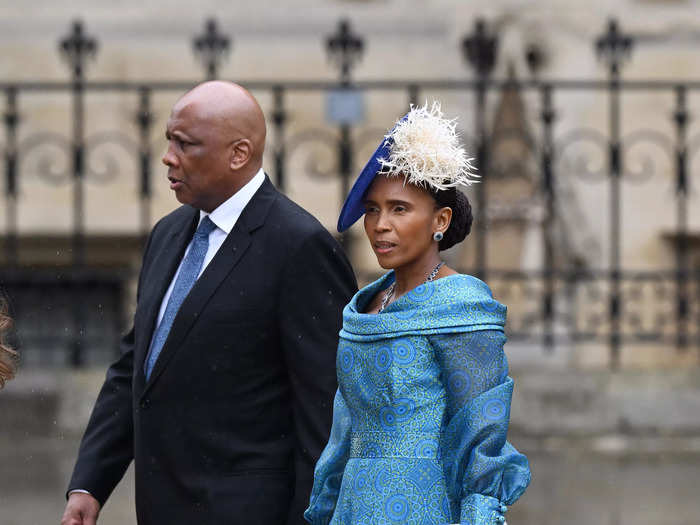 Queen Masenate Mohato Seeiso of Lesotho wore a sleeved blue dress and coordinating fascinator.