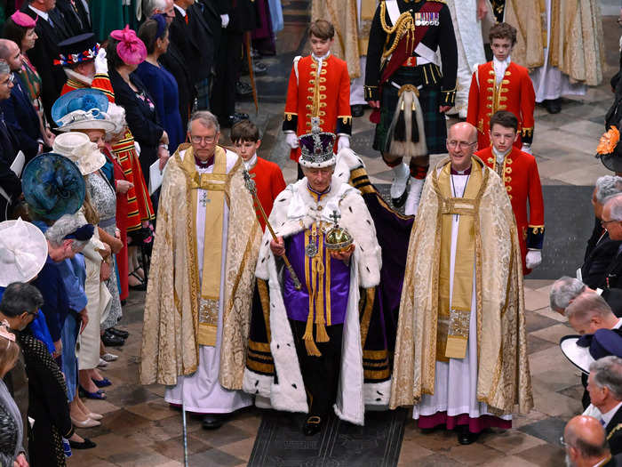 King Charles had several outfit changes, but his final look was the Robe of Estate, which is made of purple silk and embroidered in gold.