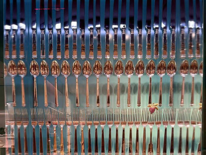 This one from 1970 features hypnotizing rows of flatware — try to spot the one fork that doesn