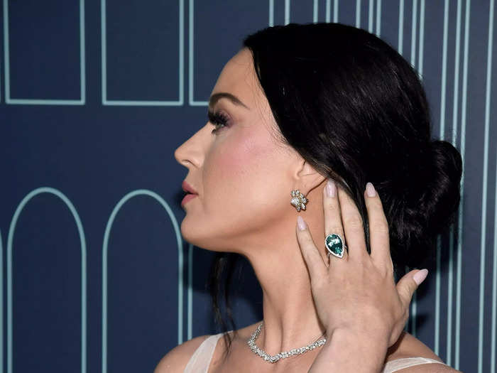 Pop star Katy Perry — decked out in jewels, of course — performed for party-goers.