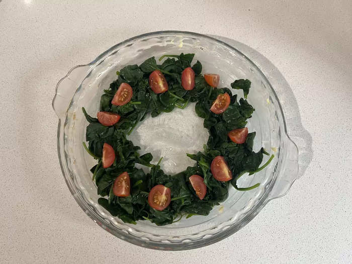 The recipe called for a single cherry tomato quartered on top of the spinach. This seemed unusual to me as it was such a small amount — I rebelled and added three.