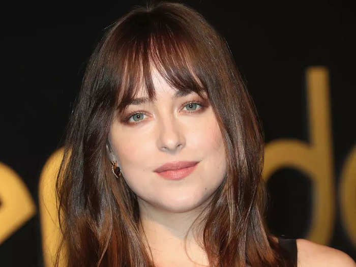 Like Deschanel, "Fifty Shades" star Dakota Johnson is known for her soft bangs.