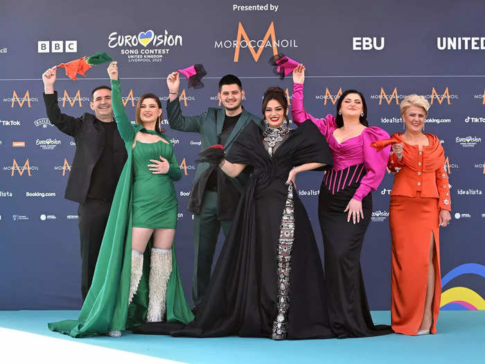 Albina & Familja Kelmendi of Albania wore regal gowns and suits.