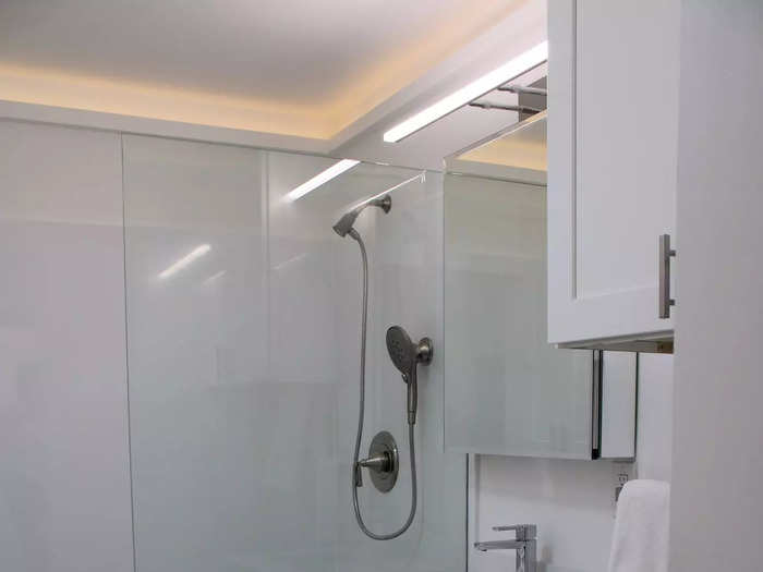 The bathroom was spacious and modern — with a large shower.