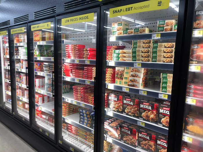 Frozen foods, like TV dinners and pizzas, were well stocked.