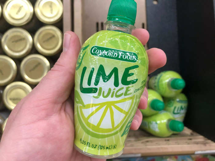 These bottles of lime juice were in a fruit crate — and right next to fresh limes.