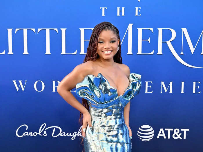 Halle Bailey attended "The Little Mermaid" premiere in a silver gown with a shell-like bodice.