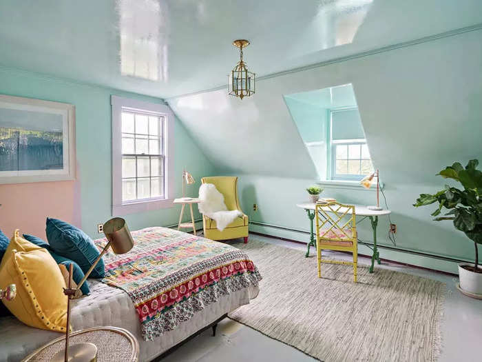 Upstairs, one of the three bedrooms has a more low-key color scheme.