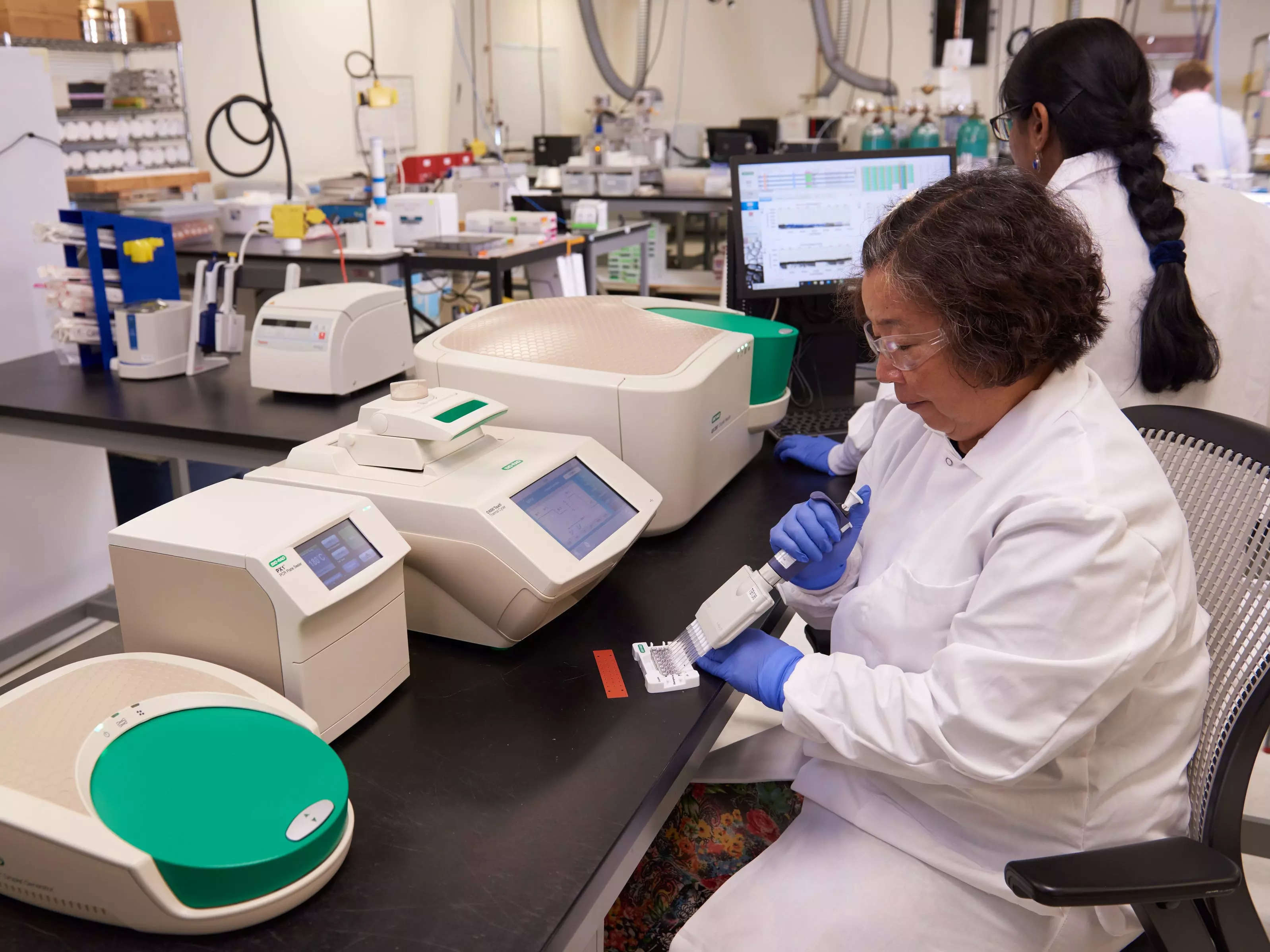 Two women work in a Trace Genomics lab