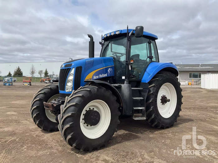 This New Holland tractor is outfitted with a mechanical front wheel drive axel, allowing for more traction in muddy or other adverse conditions. It sold for $56,085.