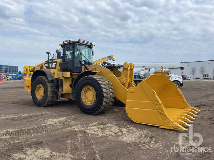 This Caterpillar wheel loader, which  can dig, haul, and transport material, comes equipped with an air-conditioned, enclosed cab and a rear-view camera. It sold $151,430.