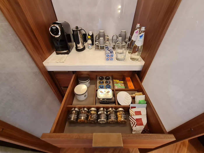 Instead of a traditional mini fridge, there was a gigantic closet with water, a coffee machine, and a selection of tea.