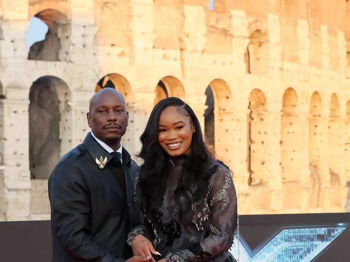 Tyrese Gibson wore white pants and a black oversized suit jacket while Zelie Timothy opted for an embroidered sheer dress.