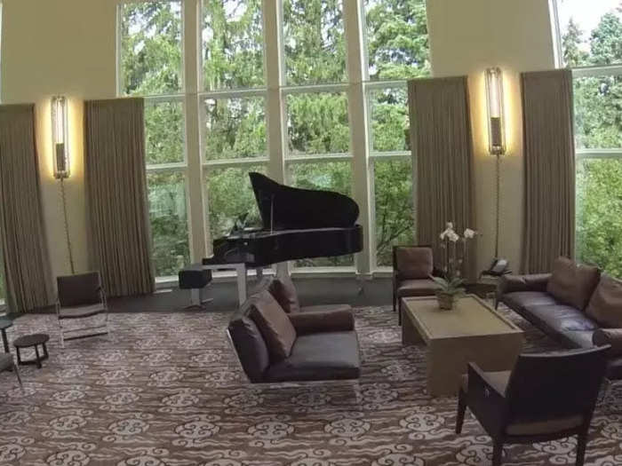 The piano room doubles as one of many sitting rooms in the house.