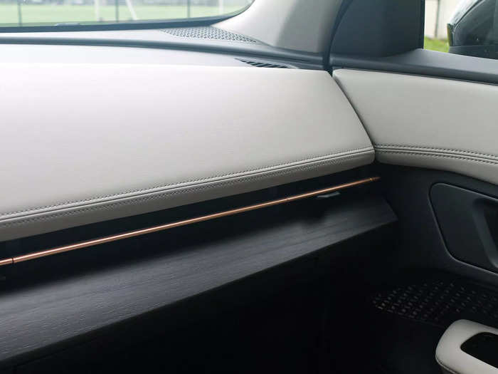 Slim air vents running across the width of the vehicle and a lack of buttons add to the minimalist, uncluttered vibe.