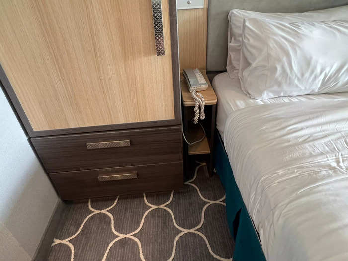 Each side of the bed had a small nightstand beside it.