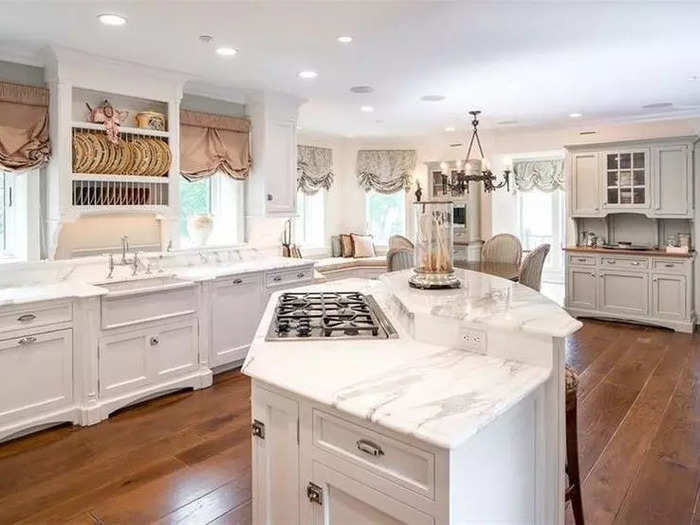 This kitchen — in the main house — is one of the five kitchens spread throughout the two-parcel property.