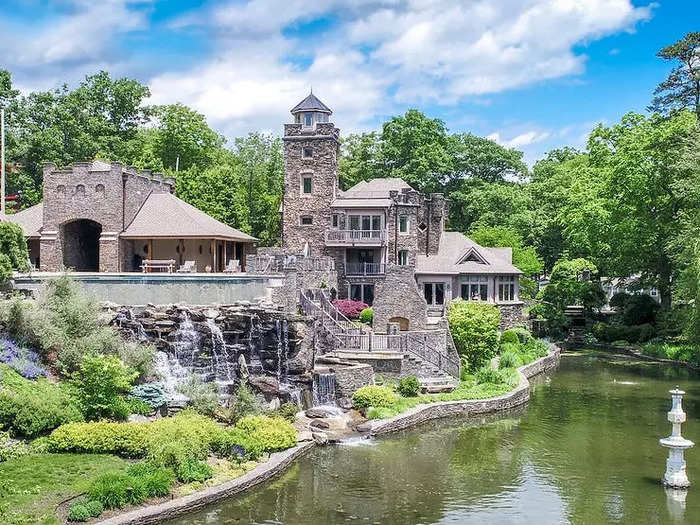 The stone home — known as Tiedemann Castle — comes complete with fountains and gardens around the outside.