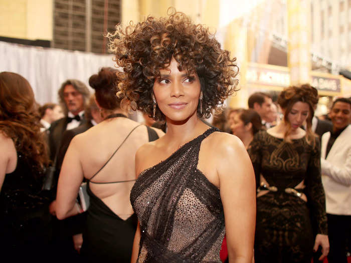 Halle Berry said she sported her signature pixie during the 1990s because some hairstylists didn