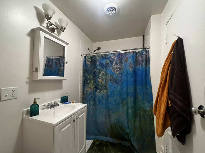 Accessible storage can help create a charming ambiance in the bathroom.