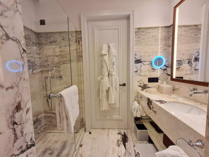 The marble bathroom was clean and modern.