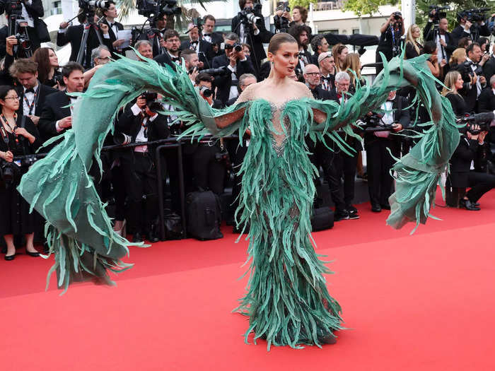 Russian actor Victoria Bonya walked the first red carpet of Cannes in a feather-covered gown.