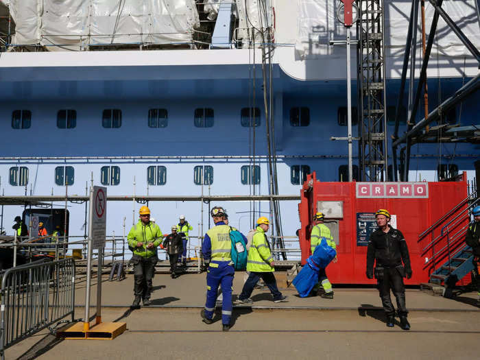 Workers are still spending their afternoons filing in and out of their floating workspace.