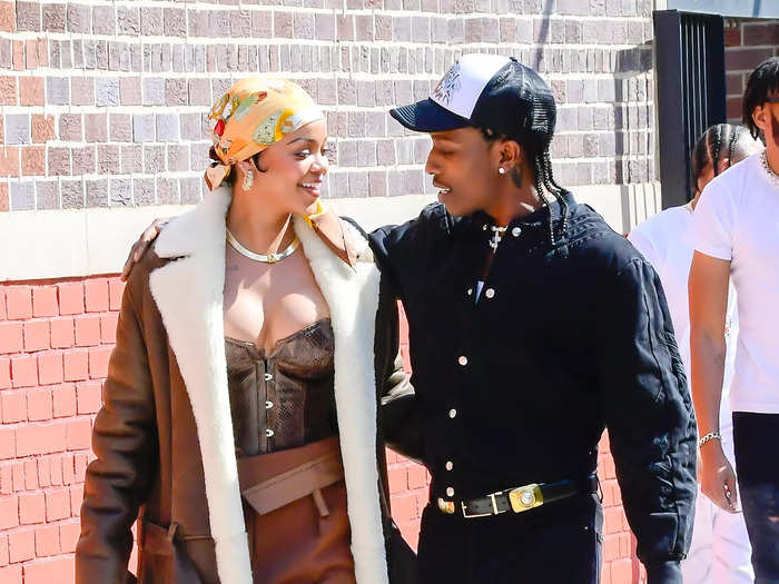 On the set of a music video in 2021, Rihanna wore a shearling oversized brown coat with a daring corset while Rocky sported a navy-blue ensemble with a baseball cap.