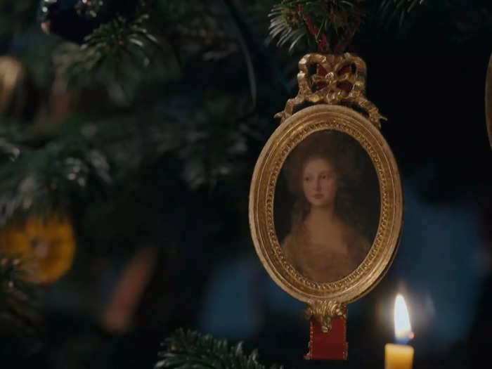 There appears to be a genuine portrait of the real Charlotte on the Christmas tree in episode three.