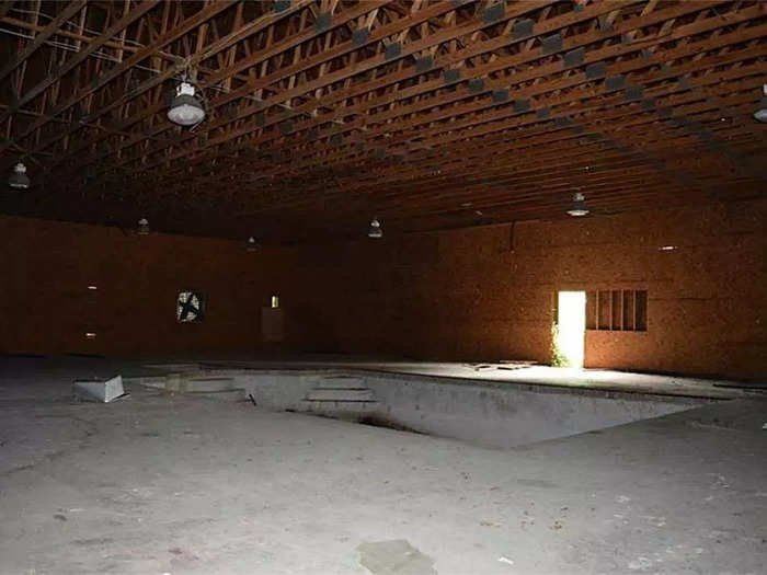 The original home had high-ceilinged atrium and the beginnings of an indoor pool. Youngblood replaced it with an 8,000-square-foot metal structure that will be the sanctuary for the church.