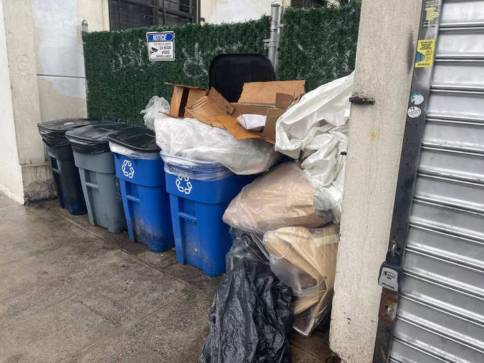 Trash is often piled up outside apartment buildings as well.