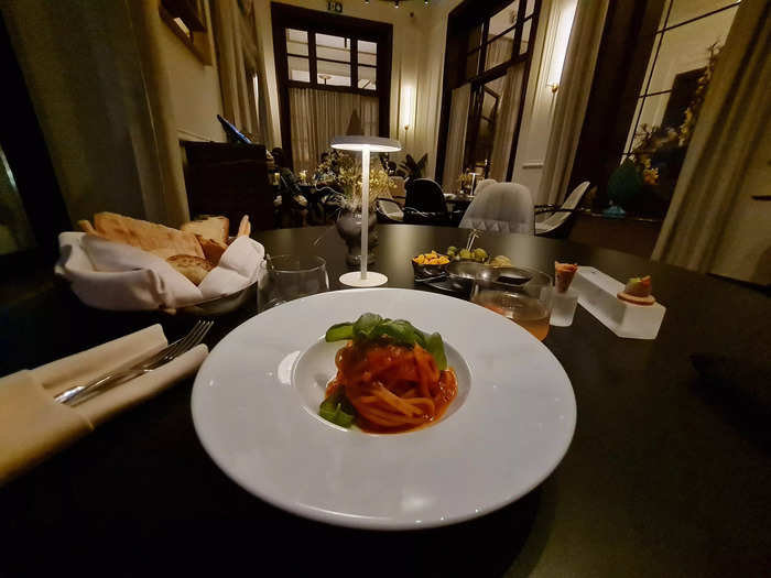 For my dinner, I ordered spaghetti with tomato sauce and basil, which cost $28.