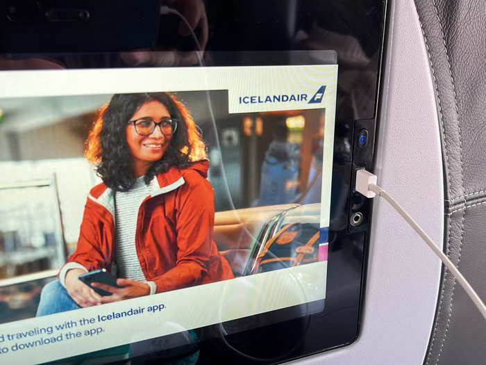 After takeoff, I could enjoy the in-flight entertainment – including movies, TV shows, and music – on the seatback screen, which also had a USB charger.