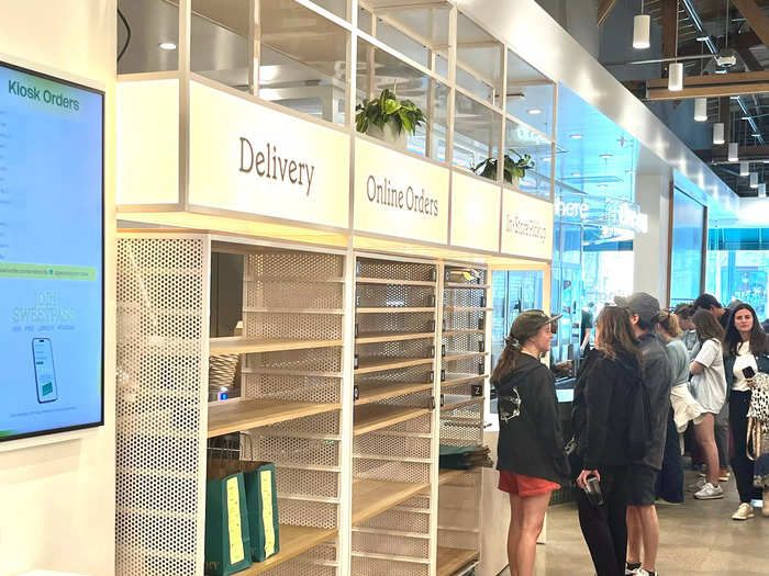 The to-go racks held orders for delivery and online order pickup. More than 60% of Sweetgreen